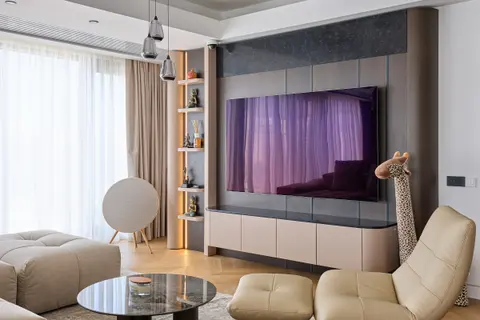 Curved living-room cabinetry