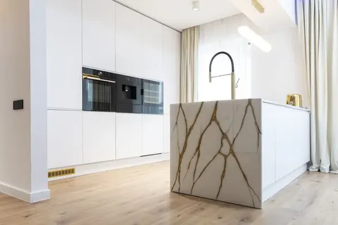 Island and tall cabinetry